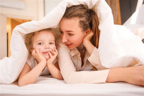 Mom And Daughter Have Fun In The Bedroom Stock Image Image Of Indoors Care 177425229