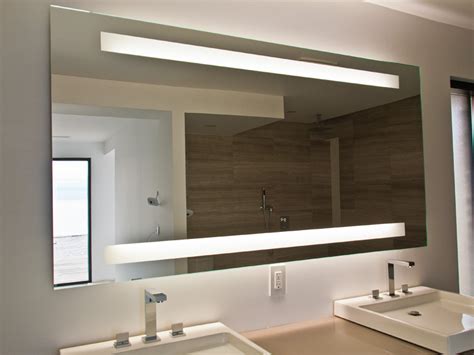 This 13w compact fluorescent bulb has a life of 10,000 hours. Lighted Mirror - LumiDesign