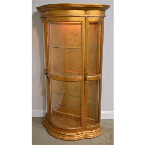 There is a color here to suit any. Hollywood Regency Vintage 1960's Serpentine Giltwood Bow Glass Curio Vitrine Cabinet | Chairish