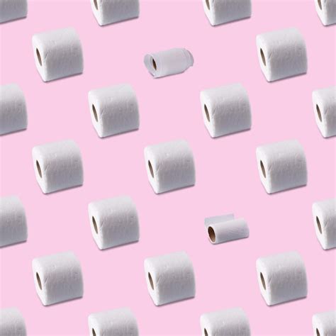 Premium Photo Rolls Of White Toilet Paper On A Pink Background
