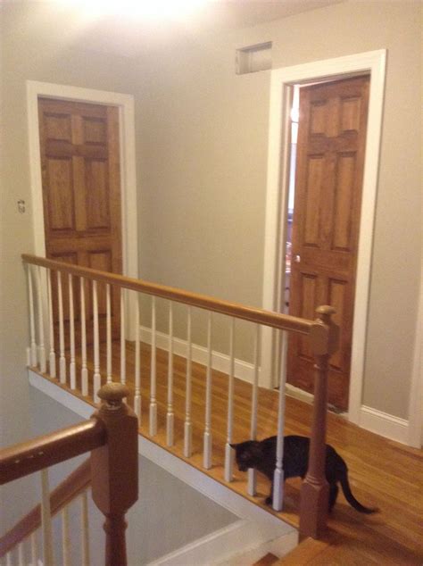 White + wood is a nice combination, and those wood doors are particularly pretty. Wood doors...stained special walnut with white trim ...