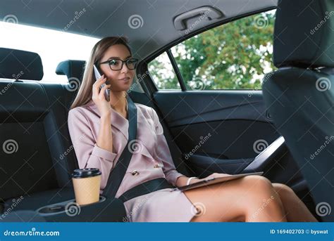 Beautiful Girl In Cabin Vip Taxi Passenger Seat In Summer City Business Call In Car Car