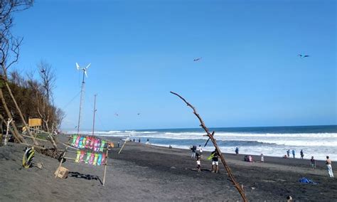 pantai baru pantai indah dengan panorama kincir angin yang unik di bantul java travel