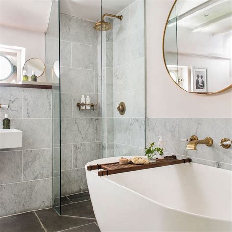 Small scandinavian master bathroom in melbourne with a freestanding tub, white tile, mosaic tile whether you want inspiration for planning a small bathroom renovation or are building a designer. Small Bathroom Design Makes A Big Difference - The Modern ...