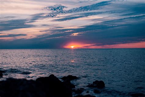 Clouds Nature Ocean Rocks Sea Sky Sunset Water 4k Wallpaper