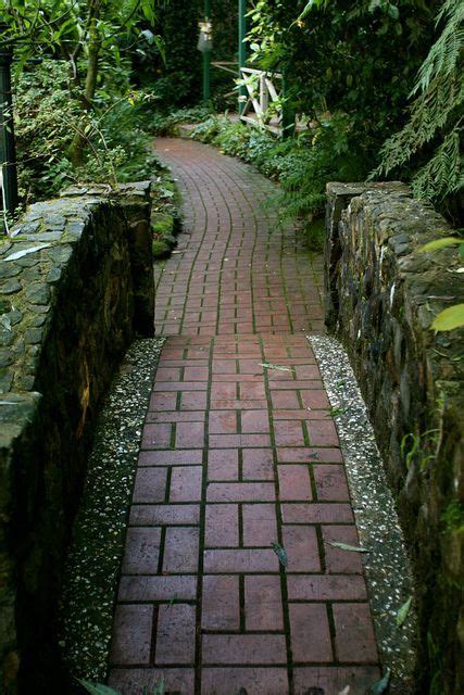 You can go with a 90 degree angle or a 45 degree angle off of any point you choose. Paver Patterns by Others... | Brick garden, Brick path ...