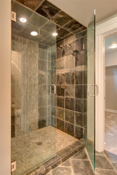 Shower and bathroom tile cost. 29 stunning natural stone bathroom ideas and pictures 2020