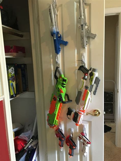 Affiliate links included for your i saw this online and his friend has a similar rack for nerf. Wall Mounted Nerf Gun Rack - Facebook - To get your nerf wall diagrammed plans with steps, click ...