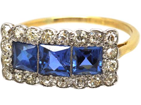 Art Deco 18ct And Platinum Three Stone French Cut Sapphire And Diamond