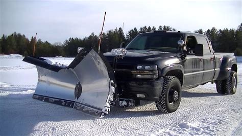 Snow Plowing Silverado 3500 With Snowdogg V Plow Pushing Snow Youtube