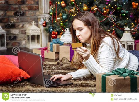 Discover more places to earn and redeem your points. Young Woman Doing Online Shopping With Credit Card And Laptop At Home. Christmas Shopping ...