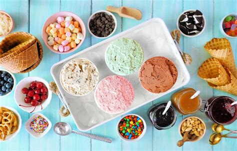 Summer Ice Cream Buffet Table Scene On A Blue Wood Background Stock