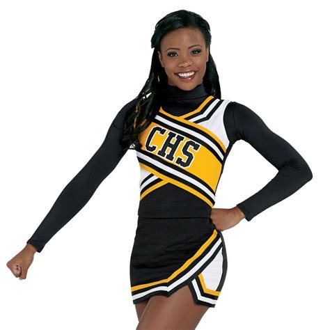 A Woman In A Cheerleader Costume Posing For The Camera