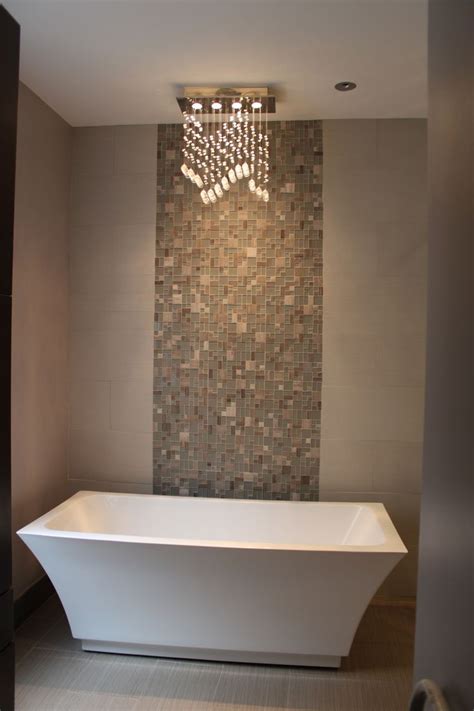 These drains only come into play when the water level rises above their opening, effectively helping to prevent water from spilling over. Freestanding Bathtub with Kohler ceiling faucet! | Master ...