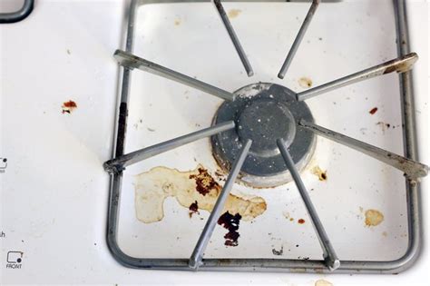 Spread the wet towel over the stove top and cover that with a trash bag to keep evaporation to a minimum and let it soak. How to Remove Burnt-On Grease From a Stove Top | eHow
