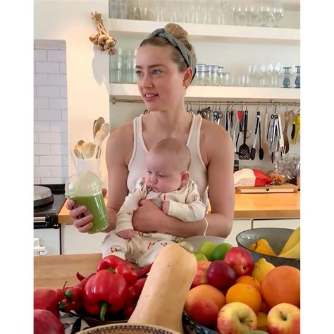 Amber Heard Shares Video With 2 Month Old Daughter Oonagh Us Weekly