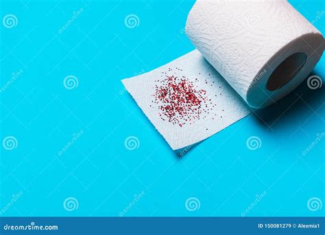 Hemorrhoids Treatment Concept Toilet Paper On A Blue Background Stock