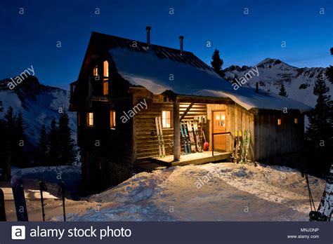 Exterior Of Wooden Log Cabin At Night In Winter San Juan