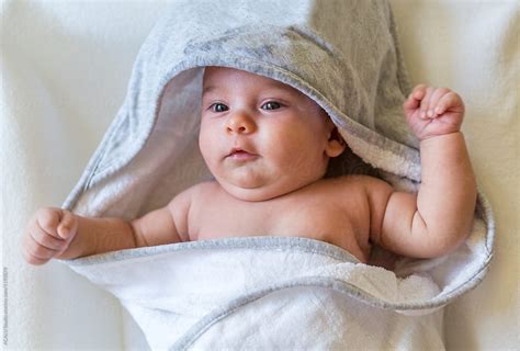 Drying Baby After Bath By Stocksy Contributor ACALU Studio Stocksy