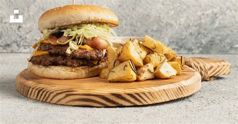 Burger With Fries On Brown Wooden Tray Photo Free Food Image On Unsplash