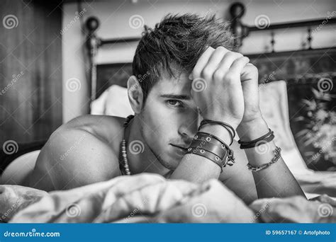 Shirtless Male Model Lying Alone On His Bed Stock Image Image Of Masculinity Seductive 59657167