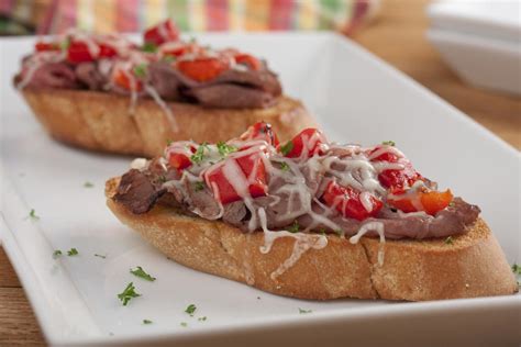 Place pork loin on the grill grates, on a diagonal, and smoke for 3 to 4 hours. Roast Beef Crostini | MrFood.com