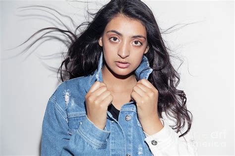 Portrait Cool Teenage Girl In Denim Jacket Photograph By Caia Image