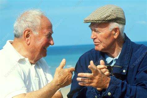 Two Elderly Men Talking At The Seaside Stock Image P9300056