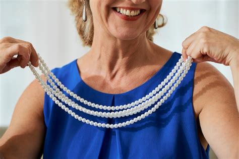 premium photo mature woman with necklace