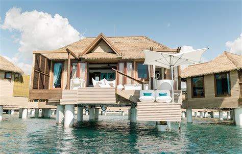 These Romantic Overwater Bungalows In Jamaica Have Glass Floors And Huge Hammocks Overwater
