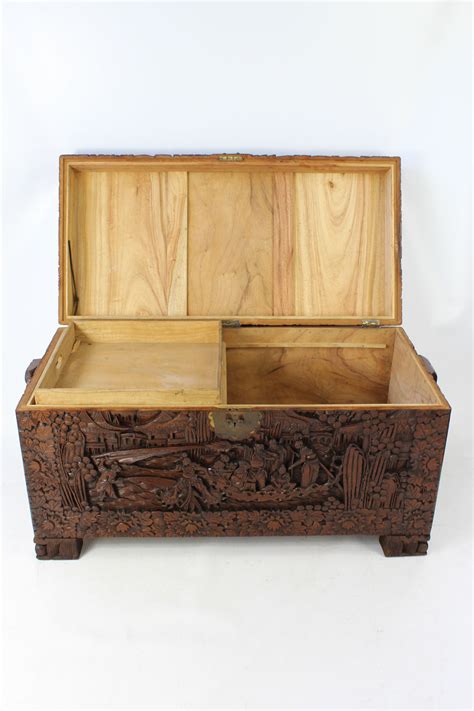 Needless to say, wood coffee tables are very common and very versatile. Carved Chinese Camphor Wood Chest / Coffee Table
