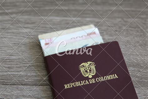 Colombian Passport With Bank Notes Photos By Canva