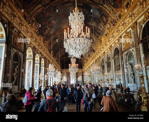 Famous Hall Of Mirrors In Versailles Palace Full Of Visitors Stock