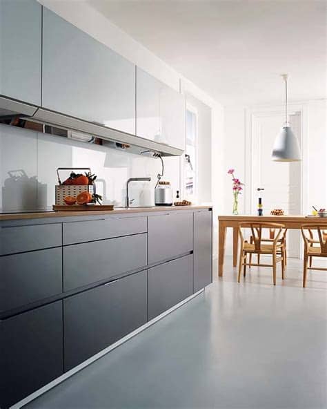 Módulos bajo encimera, para fregadero y horno, módulos altos y columnas, en colores blanco soft o gris metalizado de la gama. Cocinas de autor - Nuevo Estilo