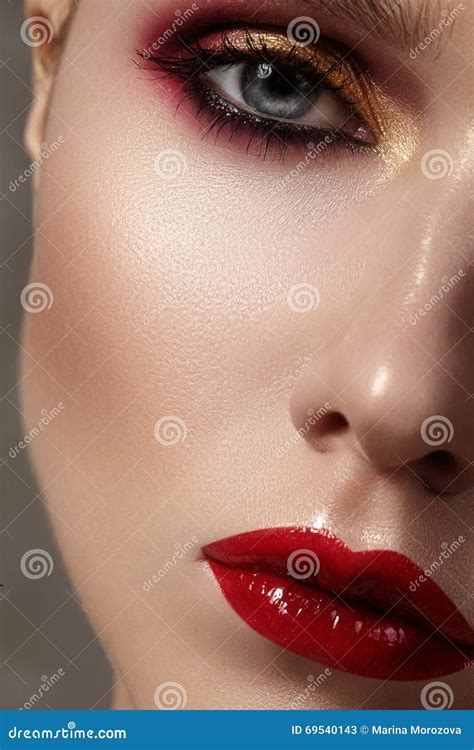 Beautiful Model With Fashion Make Up Close Up Portrait Woman With Glamour Lip Gloss Makeup