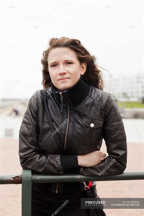 Beautiful Woman Leaning On Railing — Young Woman One Person Stock
