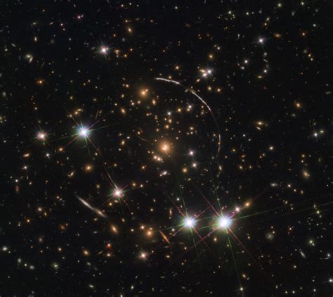 The Image Of An Ancient Galaxy Multiplied By A Gravitational Lens