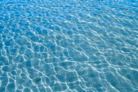 Shining Blue Water Background Stock Photo By ©tovovan 8106663