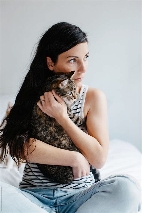 girl with cute cat by stocksy contributor luke mallory leasure stocksy