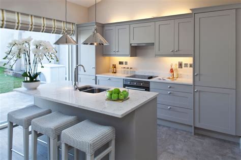 Casalese white granite worktops, accompanied by cabinets painted in farrow and ball pavilion grey #granite grey blue esher kitchen with london white granite worktops, parquet herringbone flooring and built in. Kitchen - grey cabinets with white quartz worktop | Small ...