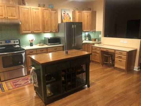 Builders surplus carries an unbeatable selection of in stock unfinished wood kitchen cabinets. Natural Knotty Alder Stained Cabinets | Knotty Alder Cabinets