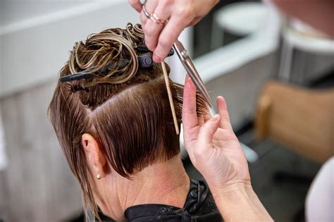 If you have shorter hair, use clips to section your hair into two or more pieces, and place a clip just above where you want to cut. Pin on Short hair with layers