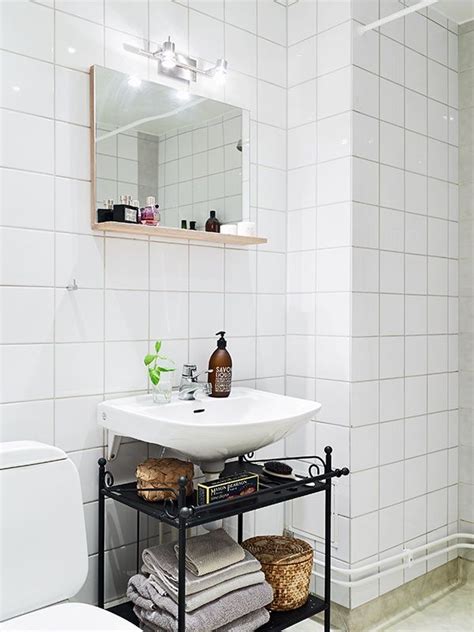 Bathroom storage always seems to be a struggle, but these floating shelves are the perfect solution for minimally invasive storage with style. Clever idea for storage under a wall-mounted sink. #home # ...