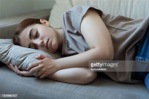 Girl Sleeping Sofa Photos And Premium High Res Pictures Getty Images