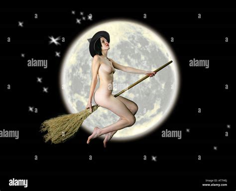Naked Halloween Witch On A Broom Stick Flying Past The Moon Stock Photo