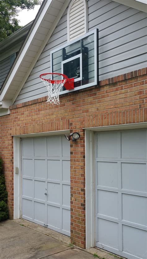 First, you'll need to evaluate the area and line the spots on the roof to know where to put. Wall-mount Basketball Hoop Installation service in MD, DC ...