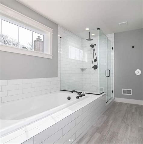 Before you start your own bathroom remodel you want to read what i learned about tub & shower trim and valves. Modern Farmhouse Bathroom. Subway tile, white subway tile ...