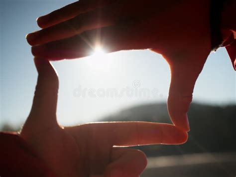 Hands Stretch Toward The Sun On Lake Level Stock Image Image Of