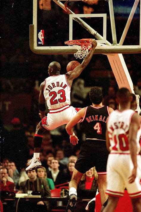 40 Stunning Photos Of Michael Jordan Soaring Through The Air Popsugar