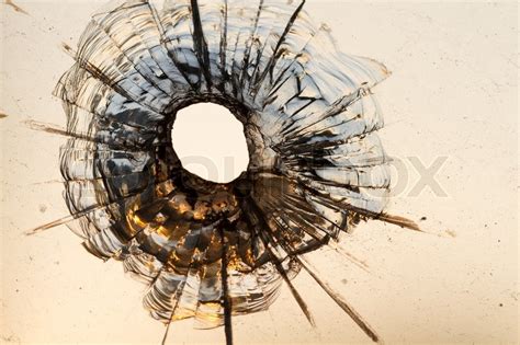 Bullet Hole In A Window Stock Image Colourbox